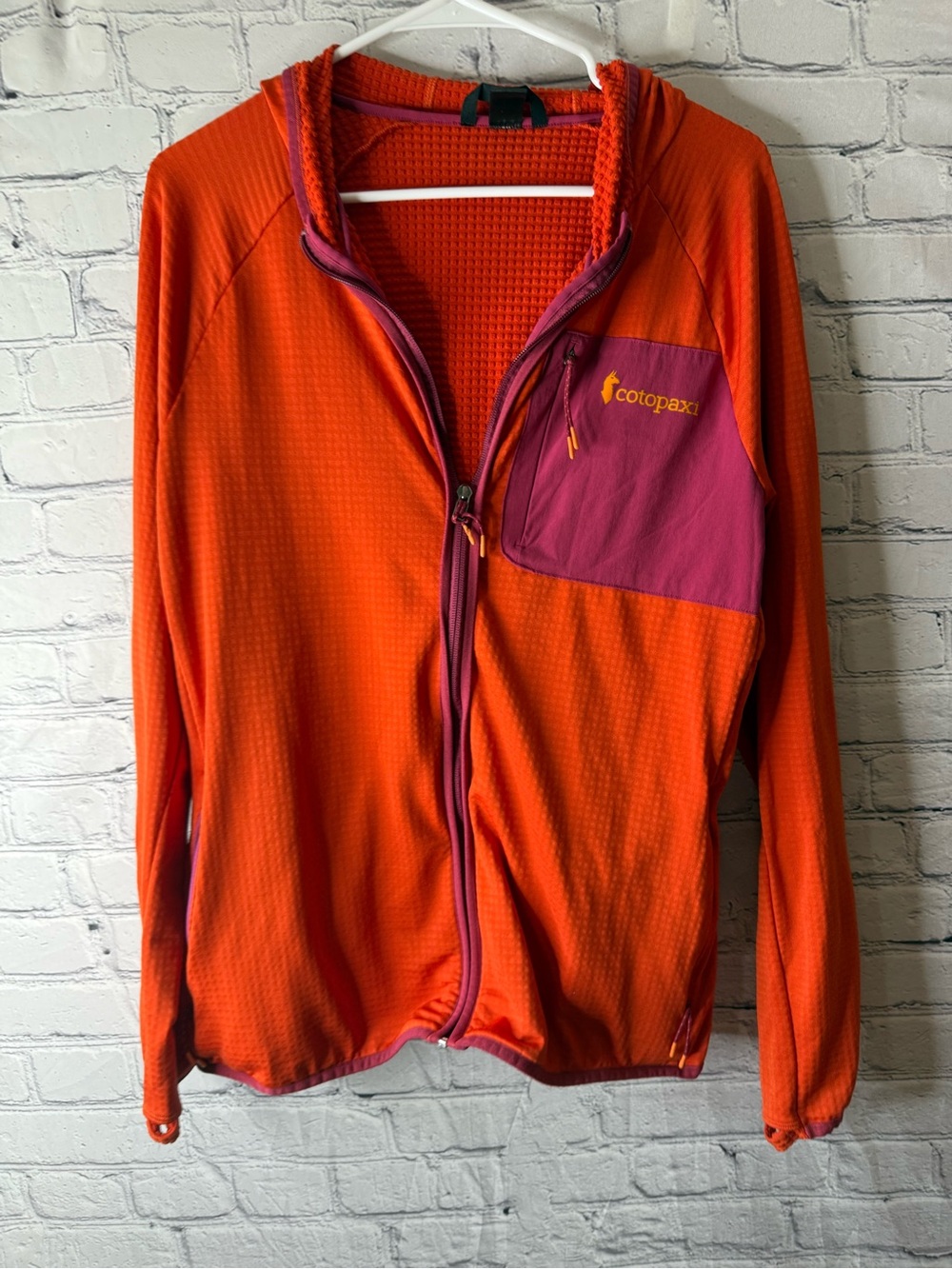 cotopaxi otero Women's Bright Orange Jacket with Purple Chest Pocket size XL